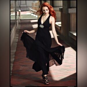 Sleek and sexy black trumpet floor length gown Sz S- Worn only once